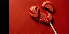 Red candy against a red background