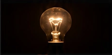 An illuminated light bulb